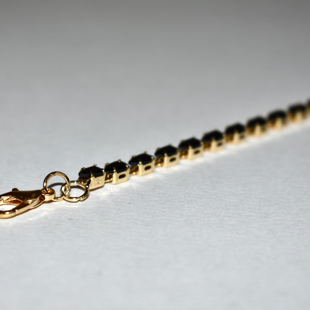 Classic Tennis Bracelet – Gold & Black Elegance
